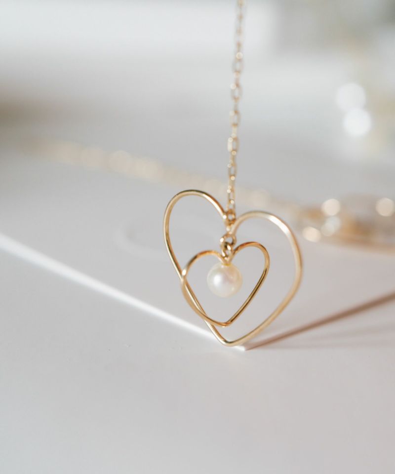パール ピアス 揺れる ハート ピアス キラキラ 【perle-hearts